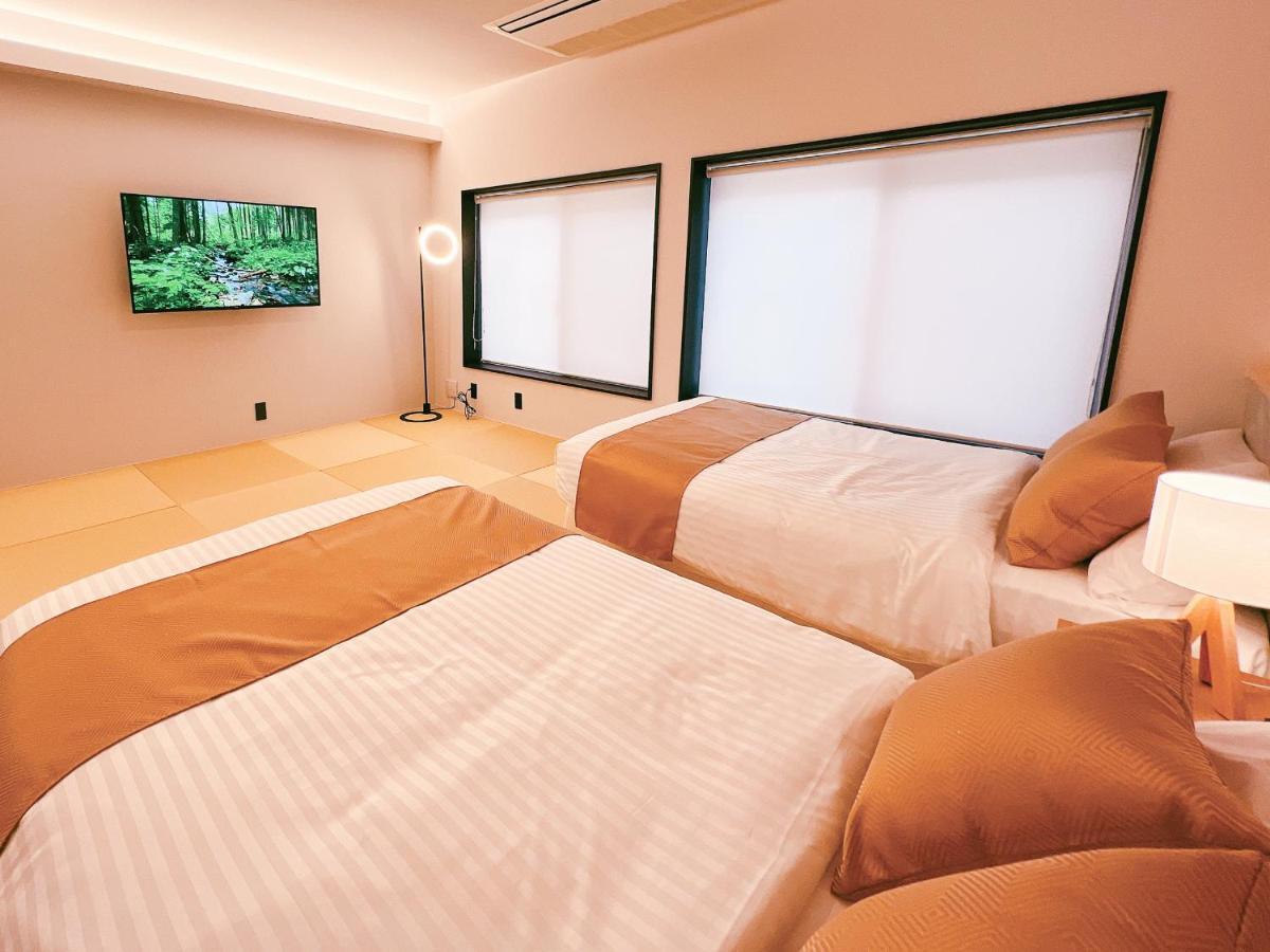 Отель Feliz Arifuku Onsen Gotsu Экстерьер фото
